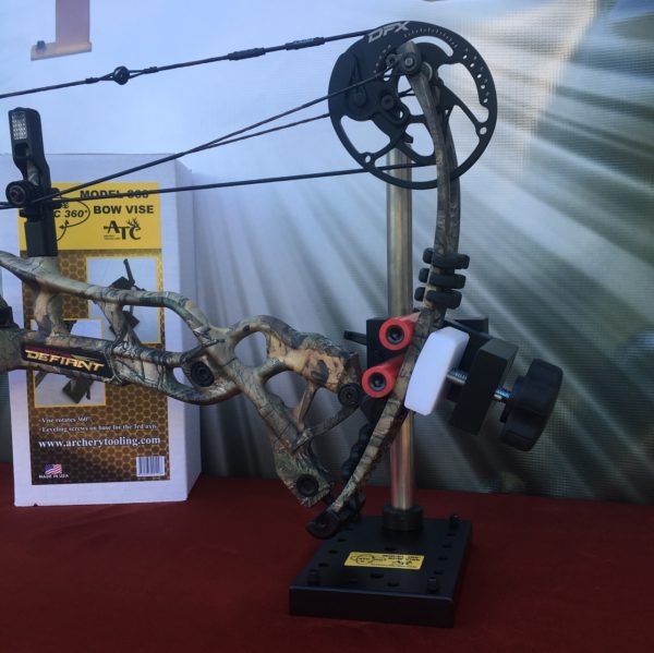 ATC Bow Vise being displayed with a bow.